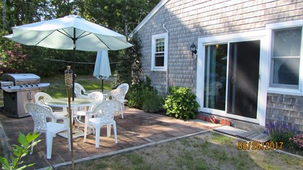 Dennisport Cape Cod vacation rental - Side entrance - Patio with gas grill