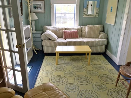 Wellfleet Cape Cod vacation rental - Colorful living room with space for a cot