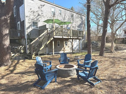Eastham Cape Cod vacation rental - Firepit for evening gatherings, outdoor shower behind the stairs.