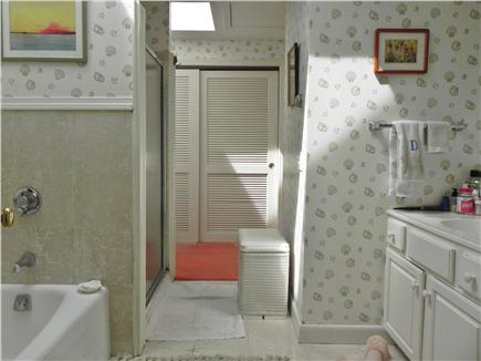 Harwich Port Cape Cod vacation rental - Master bathroom with bath and glassed-in shower
