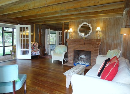 Dennisport Cape Cod vacation rental - Living room opens to screened porch and dining area