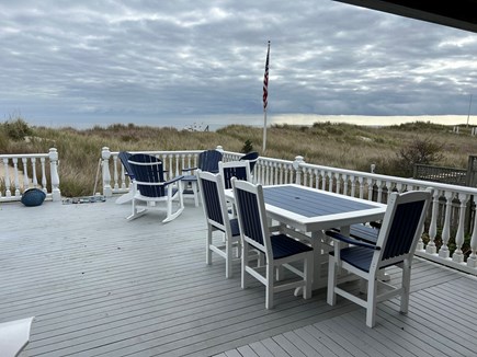 Sagamore Beach Cape Cod vacation rental - Outdoor dining with chairs and a bench
