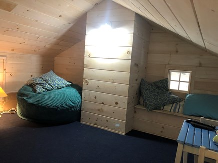 Wellfleet--Ocean Side Cape Cod vacation rental - Sleeping loft with futons, beanbag sleeper, and peekaboo window.
