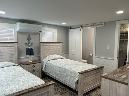 Dennisport Cape Cod vacation rental - First floor bedroom with half bath