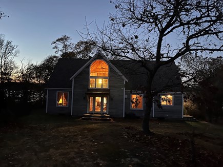 Harwich - on Long Pond. Cape Cod vacation rental - Night light highlights the front of the home