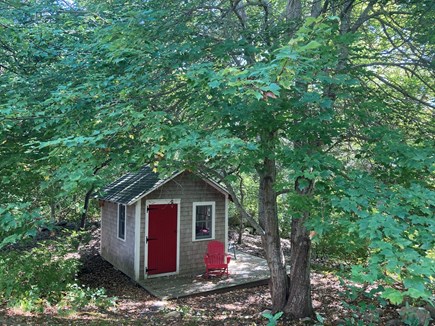 West Barnstable Cape Cod vacation rental - Tiny house in the woods, with lights, table, chairs and bed