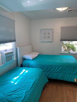 South Yarmouth Cape Cod vacation rental - Second bedroom has queen and twin bed, dresser, and closet
