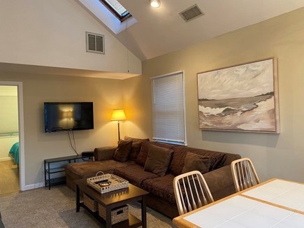 South Yarmouth Cape Cod vacation rental - Living room has a sectional sofa and loveseat for seating