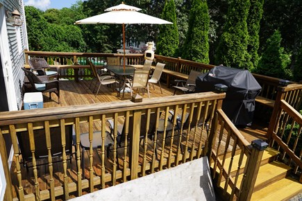 East Dennis Cape Cod vacation rental - Large back deck 16 by 20 
 with covered awning for shade
