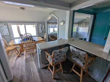 Wareham MA vacation rental - Counter & 2 bar stools overlooking dining room and out to water.