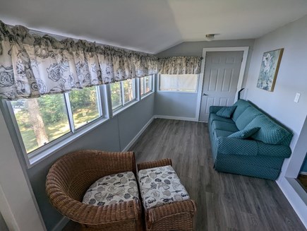 Wareham MA vacation rental - Back room overlooking the water w/Full-Size Pull-out Sofa Bed.
