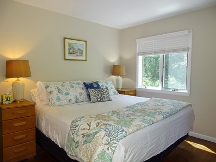 Harwich Cape Cod vacation rental - First floor bedroom with King size bed and tv.