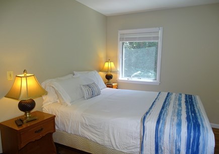 Harwich Cape Cod vacation rental - First floor bedroom with queen size bed and tv.