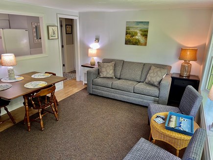 Brewster Cape Cod vacation rental - Living room offers easy access to porch and views of garden!