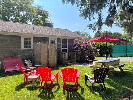 Brewster Cape Cod vacation rental - Outdoor shower, picnic table, grill, lots of plants and shade!