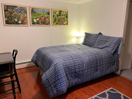 East Brewster Cape Cod vacation rental - Downstairs bedroom next to half-bath, with walkout to the yard