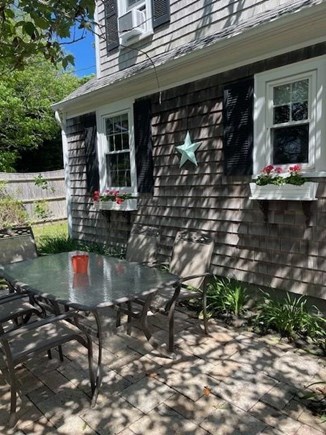 Harwichport Cape Cod vacation rental - Backyard patio off Kitchen