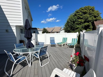 Barnstable Village Cape Cod vacation rental - Private back deck: chaises, umbrella table and seating, shower