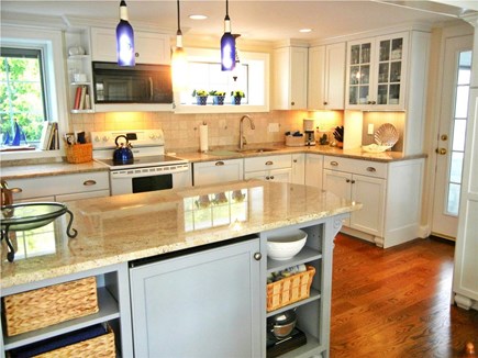 Barnstable Village Cape Cod vacation rental - Gorgeous kitchen connects to the screened breezeway and back deck