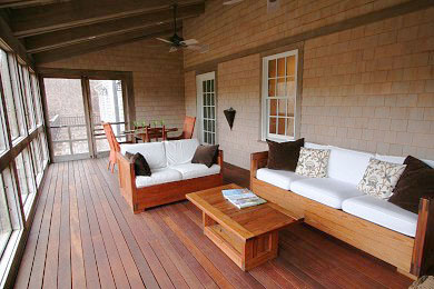 Truro Cape Cod vacation rental - French doors from the kitchen lead to porch overlooking grounds