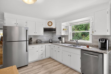 Brewster Cape Cod vacation rental - Sunny kitchen with stainless fridge, microwave, and dishwasher
