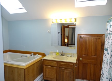 Wellfleet Cape Cod vacation rental - Master bath w Jacuzzi, shower, skylights