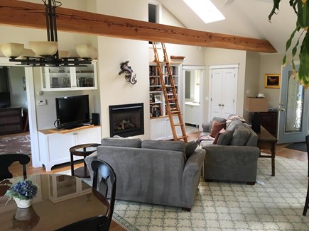 Chatham Cape Cod vacation rental - Opposite view of Living Rm, gas fireplace & ships ladder to loft