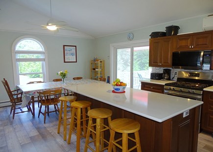 North Eastham Cape Cod vacation rental - Kitchen with breakfast bar opens to dining 