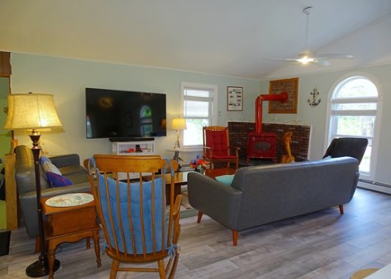 North Eastham Cape Cod vacation rental - Vaulted living room with ceiling fan, smart TV