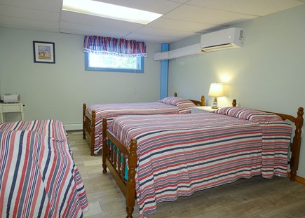North Eastham Cape Cod vacation rental - Downstairs bedroom with three twins 