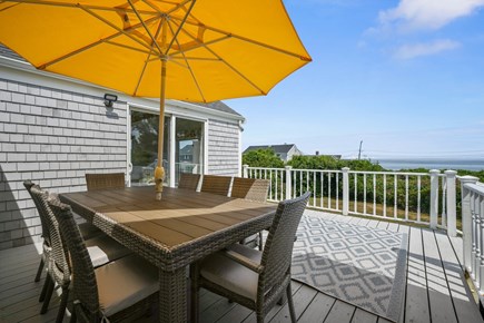 East Dennis/Sesuit Harbor Cape Cod vacation rental - Deck with Table for outdoor dining.  Seats 8
