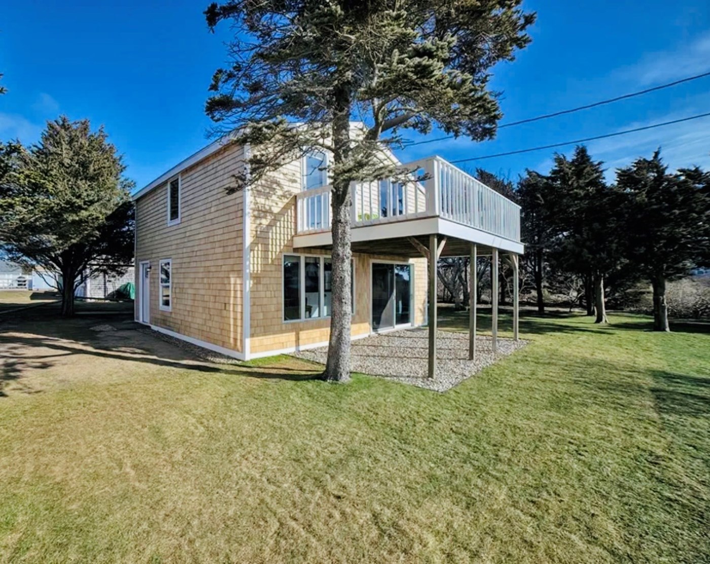 Kitchen overlooking grill, patio and Forever Wild Land.