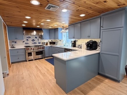 Eastham Cape Cod vacation rental - Spacious gourmet kitchen with Wolf range & Bosch appliances.