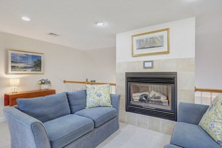 Brewster Cape Cod vacation rental - Loft area with large TV and gas fireplace