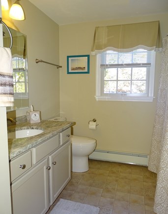 Forest Beach, South Chatham Cape Cod vacation rental - 2nd floor bath: tub/shower, linen closet & ecofriendly fixtures