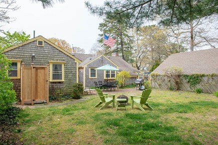 South Yarmouth Cape Cod vacation rental - BBQ, outdoor shower, fire pit & casual seating for 6 at the table