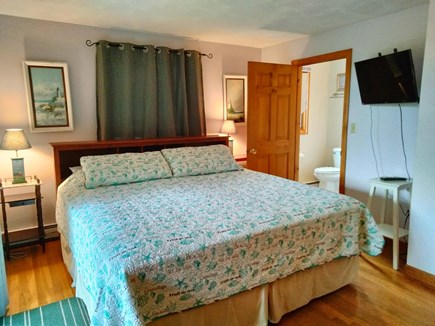 Eastham Cape Cod vacation rental - Master Bedroom with King bed and full bath with walk in shower.