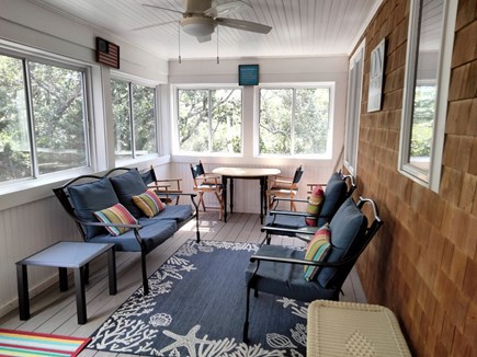 Eastham Cape Cod vacation rental - Enjoy cool breezes and shade on the screened porch.