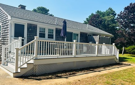 Dennisport Cape Cod vacation rental - Oversized deck for outdoor dining, private shower and large yard