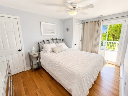 Dennisport Cape Cod vacation rental - Al fresco bedroom with a queen bed, closet and dresser.