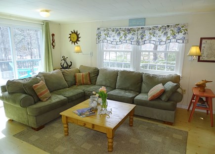 Eastham Cape Cod vacation rental - Living room with sliders to large deck 