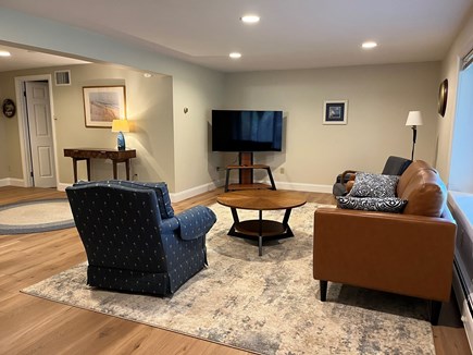  South Harwich Cape Cod vacation rental - Renovated downstairs family room with 55" smart/cable tv.