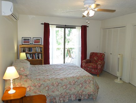 Harwich Cape Cod vacation rental - Queen Master bedroom on first floor with slider to deck