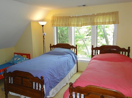Harwich Cape Cod vacation rental - Upstairs twin bedroom with smaller toddler bed too