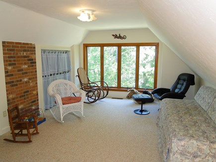 Harwich Cape Cod vacation rental - Loft area upstairs with toys and day bed