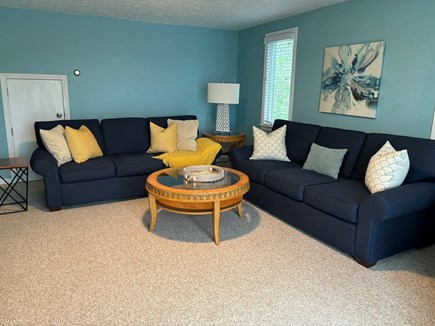 West Dennis Cape Cod vacation rental - Second-floor family room with deck overlooking water