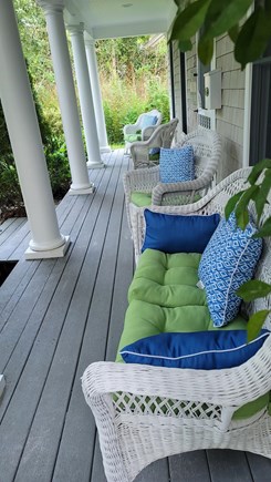 Brewster Cape Cod vacation rental - Front porch with wicker chairs for enjoying your morning coffee.