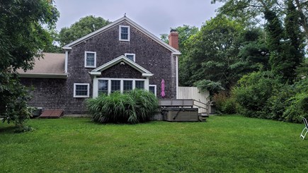Brewster Cape Cod vacation rental - View from back yard, hammock and firepit to right out of frame.
