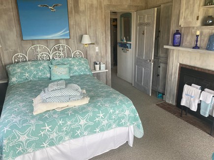 West Yarmouth Cape Cod vacation rental - Master bedroom 1st floor with fireplace and queen bed
