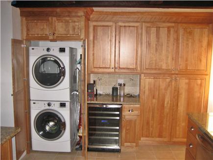 West Yarmouth Cape Cod vacation rental - Kitchen with laundry an wine bar
